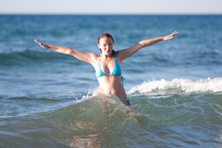 beauty and sexy woman having fun in waterの写真素材