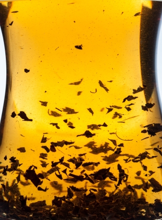 Cup of tea extreme closeup on white backgroundの写真素材