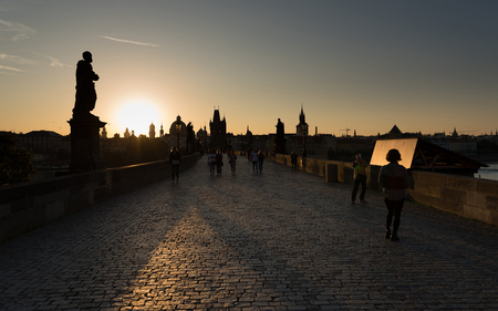 PRAGUE, CZECH REPUBLIC - 11 September 2018: People walking on the Charles Bridge in Prague, Czech Republic.Charles Bridge is a famous historical bridge that crosses the Vltava riverのeditorial素材