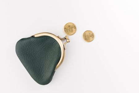 small leather wallet and  two gold coins  isolated on white background, top viewの写真素材