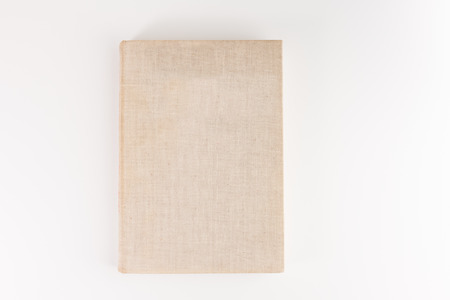 vintage book isolated on white backgroundの写真素材