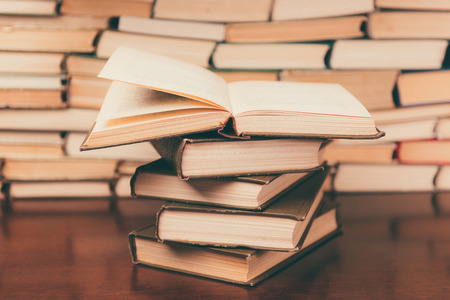 stack of books on the wooden tableの写真素材