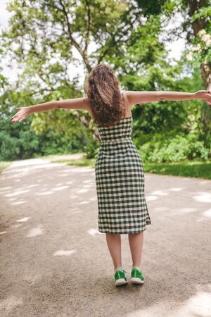 Happiness concept - happy woman having fun outdoors during summerの写真素材