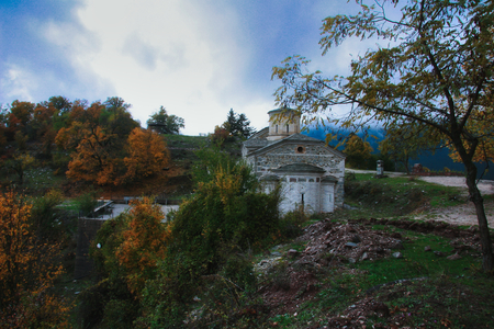 Agia Paraskevi Church in Trikala in an autumn and cloudy backgroundの写真素材