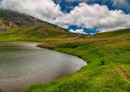 View of dragon lake, Smolikas, Pindos mountains, Epirus, Greeceの写真素材