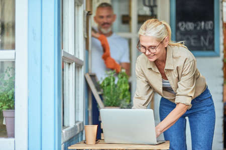 Middle aged caucasian woman and partner looking at herの写真素材