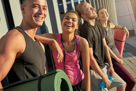Portrait of young sportive people smiling at cameraの写真素材
