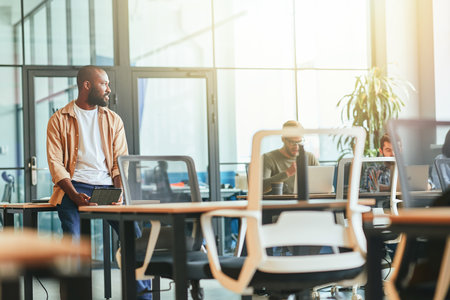 Handsome young Afro-American man at a coworking spaceの写真素材