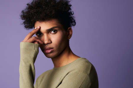 Close up portrait of african american model looks camera. Attractive male with afro hairstyleの写真素材