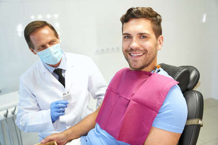 Happy patinet of dental clinic during a dentist appointmentの写真素材
