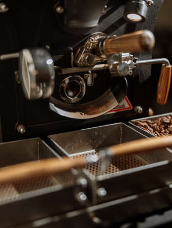 Coffee roasting machine with containers for beansの写真素材