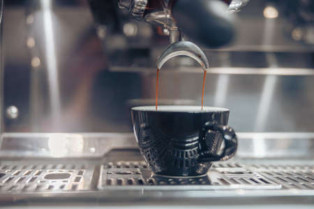 Professional coffee machine brewing coffee in cafeの写真素材