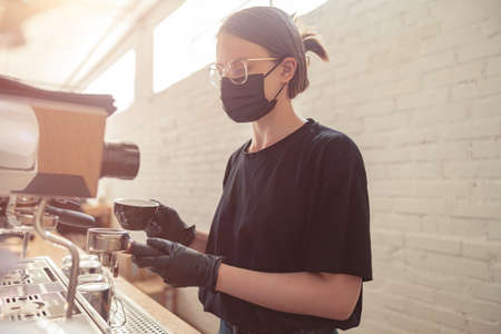 Professional barista making coffee, service and cateringの写真素材