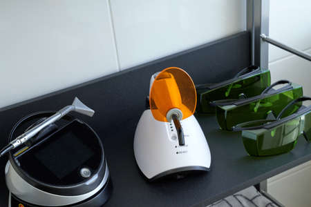 Modern equipment for laser-curing of teeth at dentist officeの写真素材