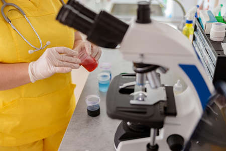 Laboratory assistant conducting researches in veterinary laboratoryの写真素材