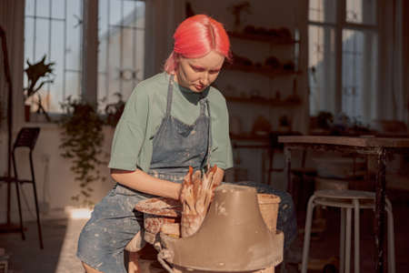 Diligent master molding clay product in pottery roomの写真素材