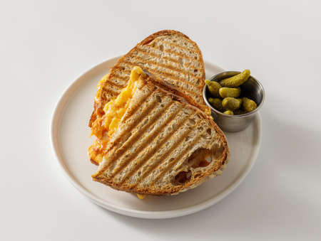 Hot toast with melting cheese in sliceの写真素材