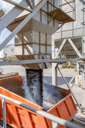 Photo of loading process of construction material at factoryの写真素材
