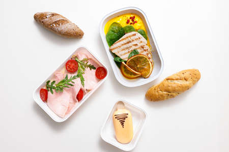 Cold cuts and full meals in paper containersの写真素材