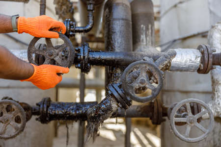 Construction engineer working with equipment in plantの写真素材