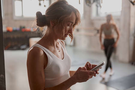 Attractive woman after functional training in gymの写真素材