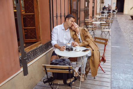 Couple resting and having fun together outsideの写真素材