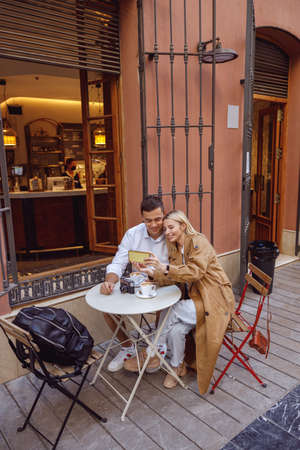 Happy couple resting and taking a pictureの写真素材