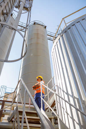 Construction industry worker working at manufacturing facilityの写真素材