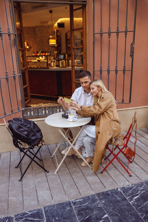 Man and woman resting together after walkの写真素材