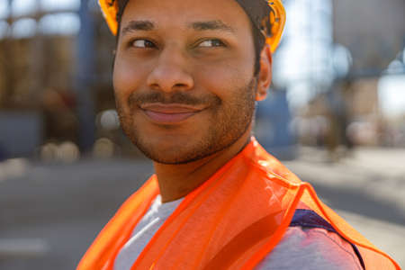 Photo of happy male multiethnic worker in plantの写真素材