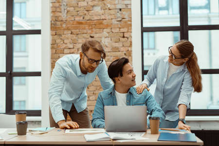 Business people teamwork on laptop in modern officeの写真素材
