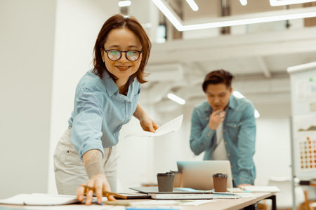 Two people are busy with a new project in a co-working spaceの写真素材