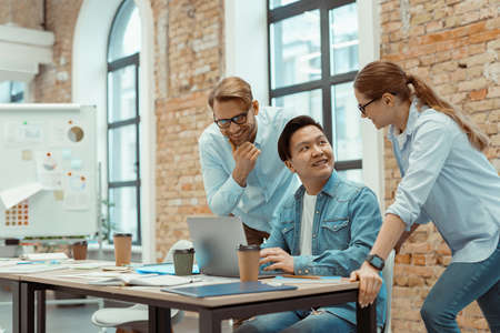 Management teamwork and business partnerships in the officeの写真素材