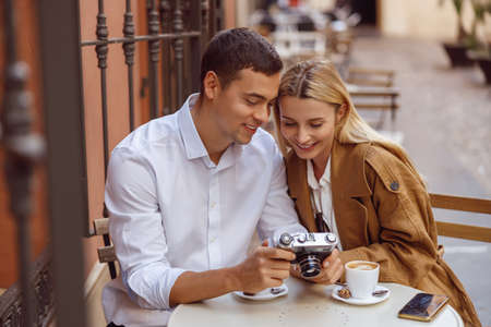 Woman and male resting after walk outsideの写真素材