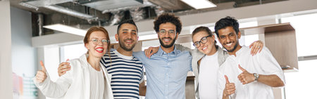 Diverse group of colleagues enjoying working together in an office. Teamwork conceptの写真素材