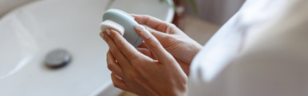 Close up of electro cleanser for face and massager at bathroom. Facial care and cleaning.