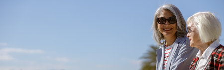 Shot of adult modern women resting outdoors