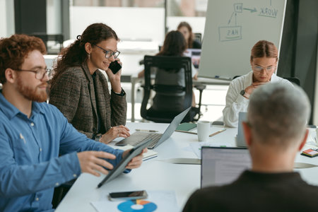 Group of diverse people discussing new project in office meeting room. Business teamwork situation