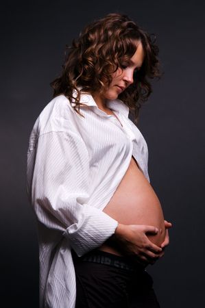 pregnant woman looking at her belly #2の写真素材