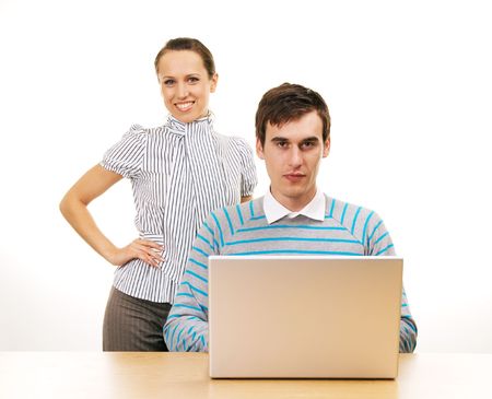 businessman and woman with laptop over white backgroundの写真素材