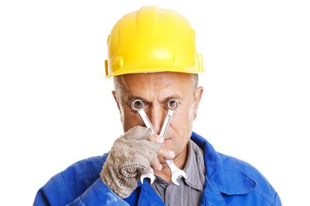 workman looking through screw keys. isolated on whiteの写真素材