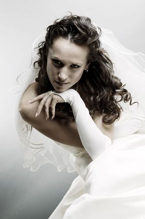 portrait of beautiful bride over grey backgroundの写真素材