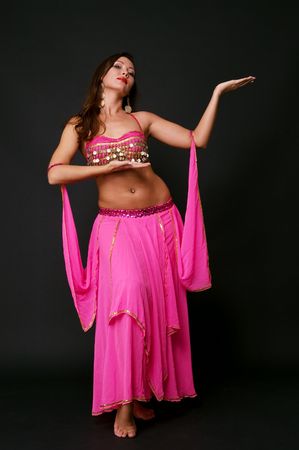 lovely dancer in stage costume over blackの写真素材
