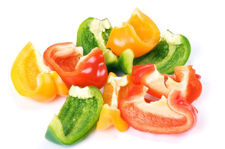 pieces of paprika isolated on white backgroundの写真素材
