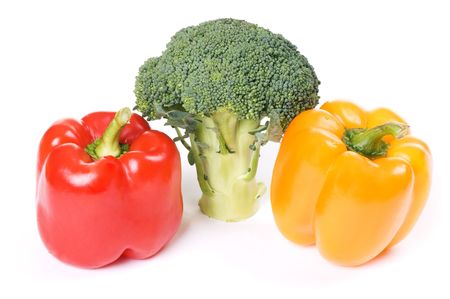 red and orange paprika with broccoli isolated on white backgroundの写真素材