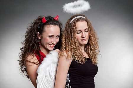 cunning devil have a sly plan relative to angelの写真素材