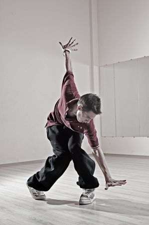 hip-hop boy posing in dance studioの写真素材