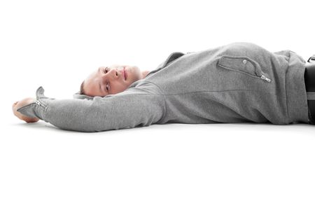 young man relaxing. isolated on whiteの写真素材