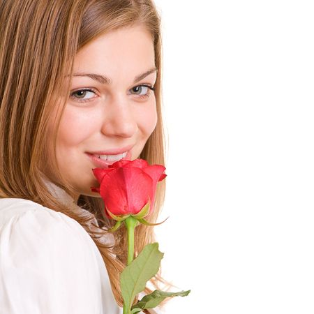 close-up portrait of lovely girl with red roseの写真素材