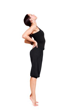 sportswoman doing stretch exercise. isolated on whiteの写真素材